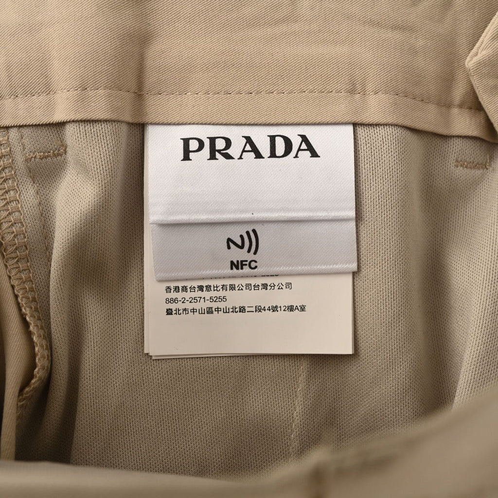 Prada Beige Triangle Charm Pleated Straight Leg Trousers